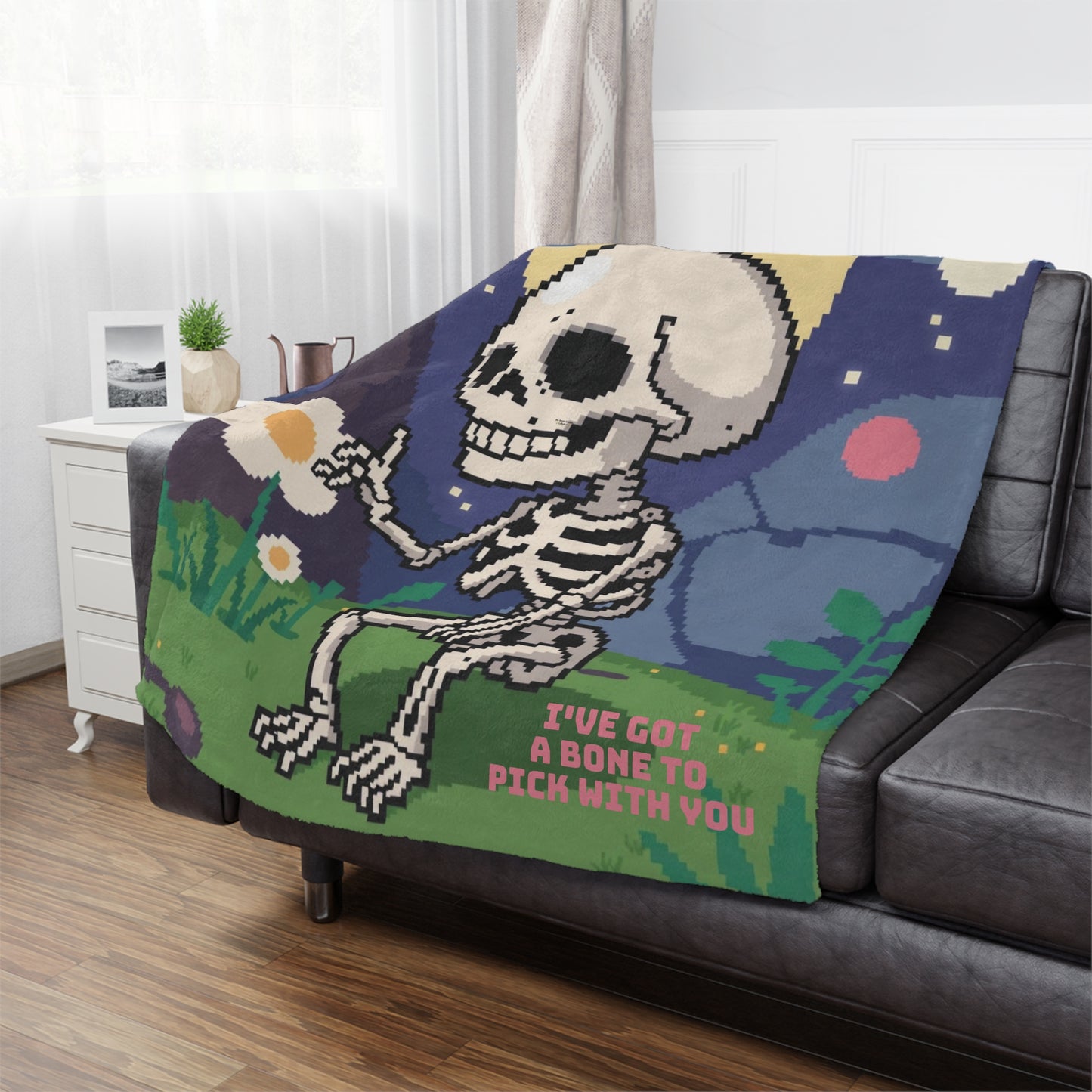 Cozy Skeleton Minky Blanket, 50x60 inches on couch — soft plush throw for living room décor by The Inner Horizon Collective