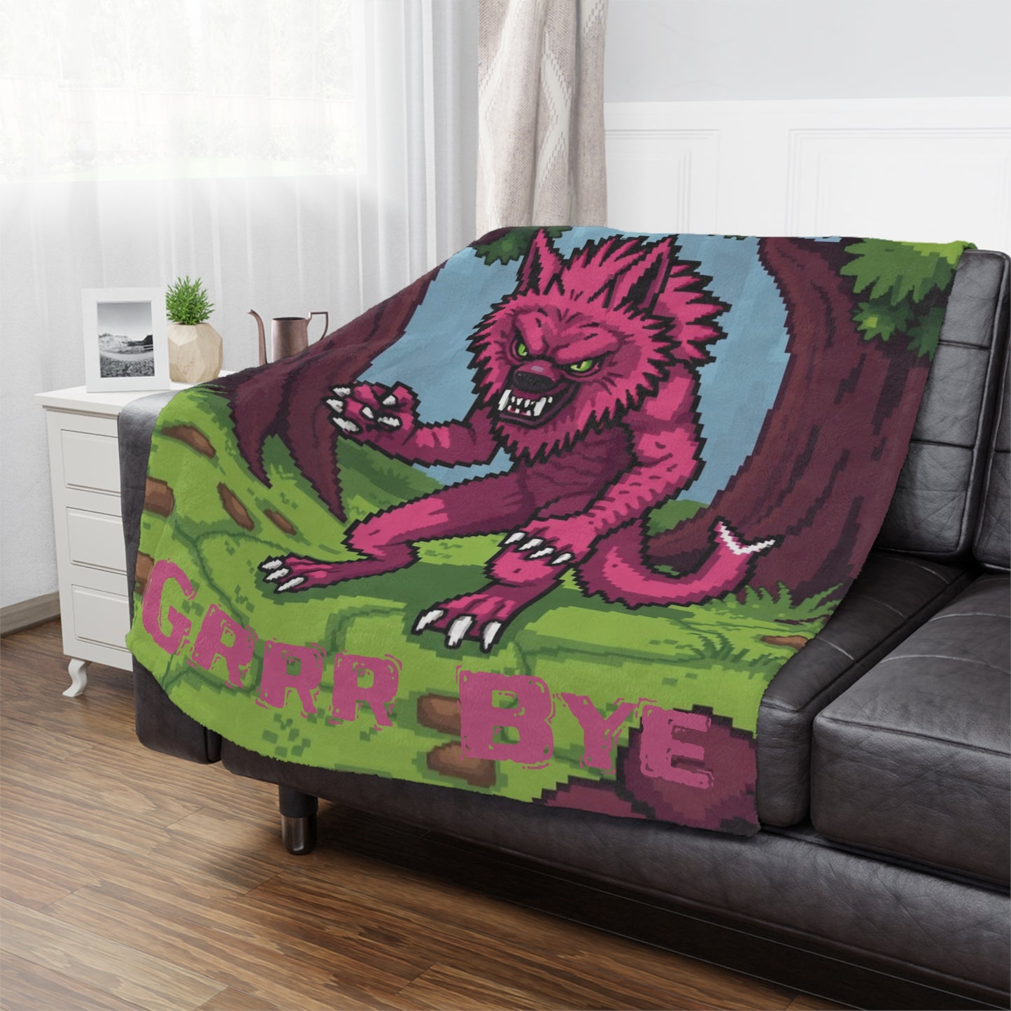 “Grrr Bye” Pink Werewolf Minky Blanket, 50x60 inches on couch — soft plush throw for living room décor by The Inner Horizon Collective