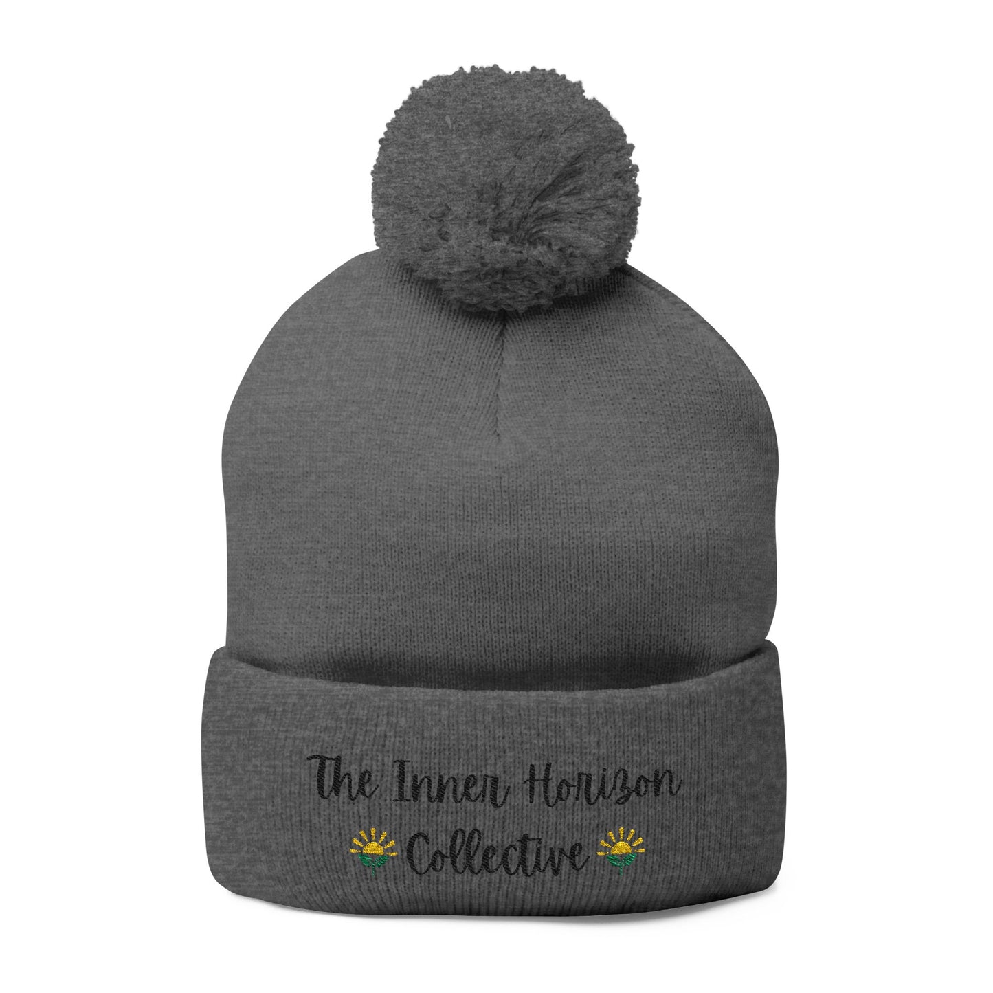Front view of Pom-Pom Knit Cap in dark heather grey — winter hat with pom-pom and logo embroidery