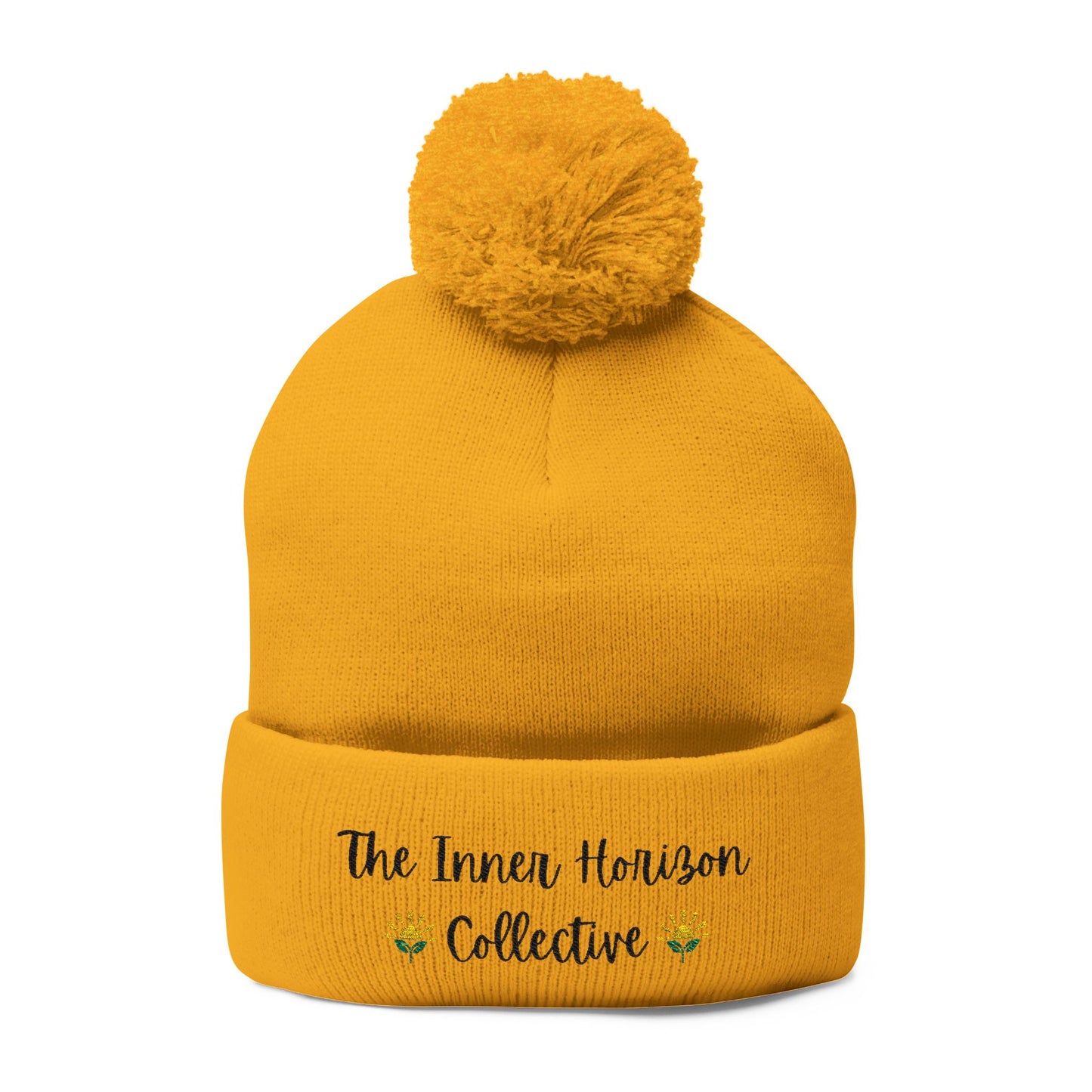 Front view of Pom-Pom Knit Cap in gold — warm winter hat with pom-pom and embroidered logo