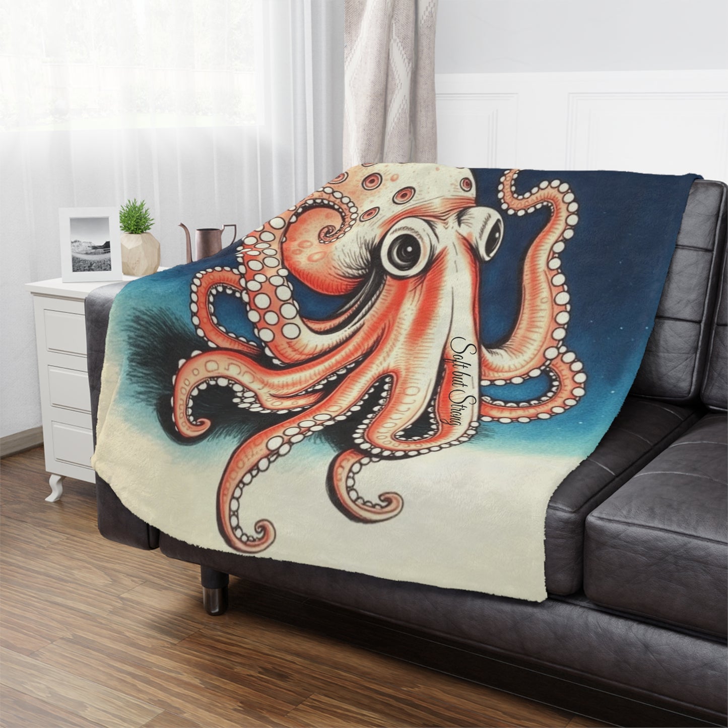 Soft But Strong Octopus Minky Blanket, 50x60 inches on couch — soft plush throw for living room décor by The Inner Horizon Collective