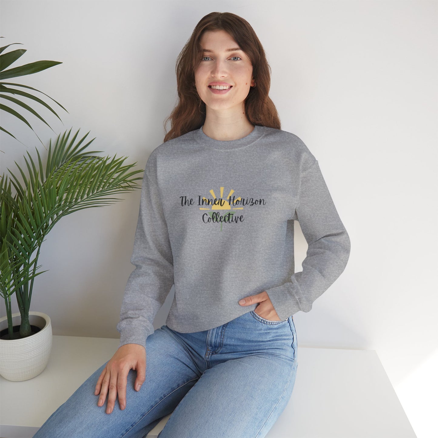 Front view of The Inner Horizon Collective unisex sweatshirt in Sport Grey with black logo — versatile streetwear pullover.