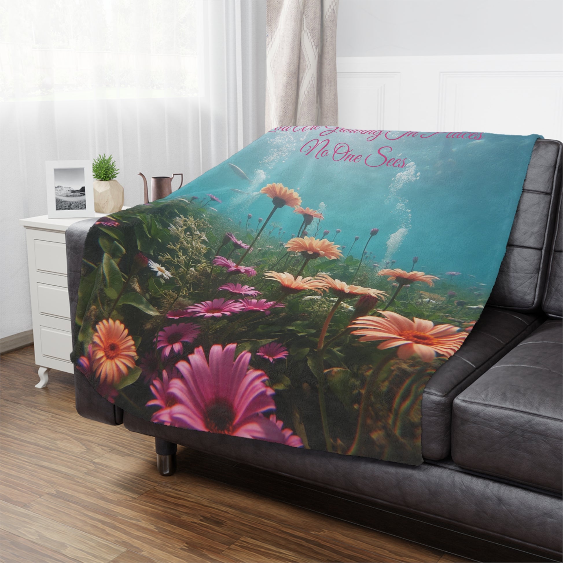 Growing In Places No One Sees Minky Blanket, 50x60 inches on couch — soft plush throw for living room décor by The Inner Horizon Collective