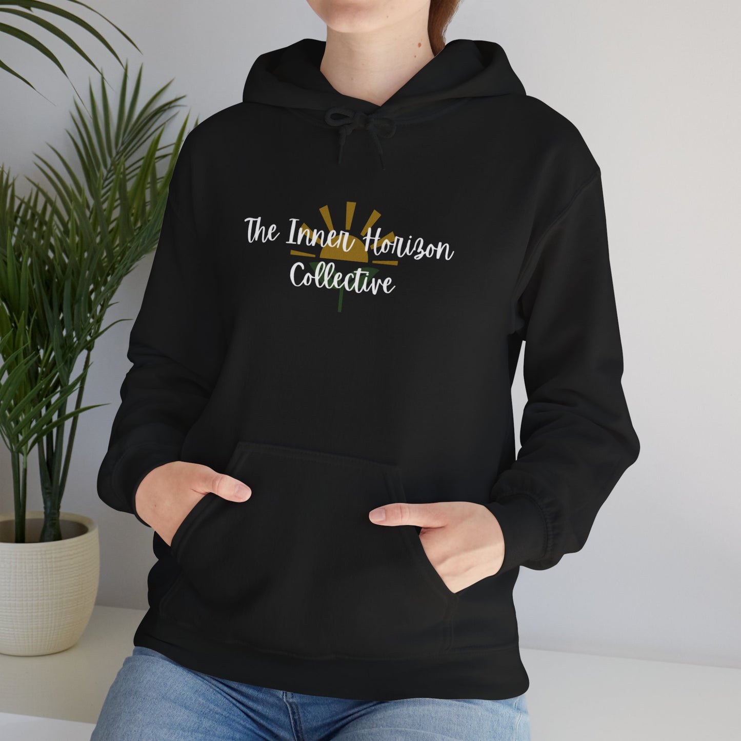 Front view of hoodie in black— unisex hooded sweatshirt with white logo by The Inner Horizon Collective 
